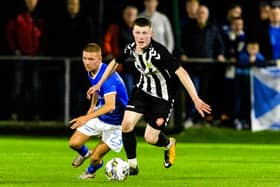 Threave Rovers' Charlie Watson on the ball during the Scottish Gas Scottish Cup second round match against Stranraer at Meadow Park on October 25, 2024. (Photo by Ross MacDonald / SNS Group)