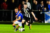 Threave Rovers' Charlie Watson on the ball during the Scottish Gas Scottish Cup second round match against Stranraer at Meadow Park on October 25, 2024. (Photo by Ross MacDonald / SNS Group)
