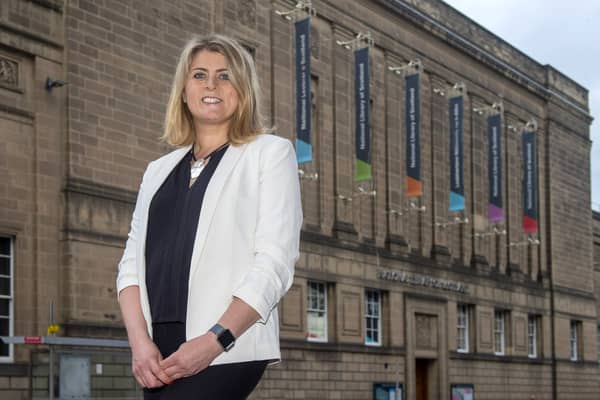 National Library of Scotland chief executive Amina Shah in front of the building.