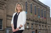 National Library of Scotland chief executive Amina Shah in front of the building.