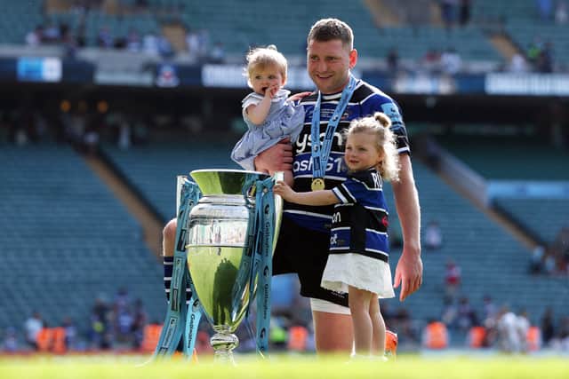 Finn Russell poses with his children and the trophy after Bath's win over Leicester Tigers in the Gallagher Premiership final at Twickenham.