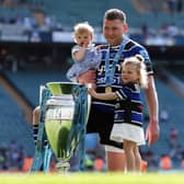 Finn Russell poses with his children and the trophy after Bath's win over Leicester Tigers in the Gallagher Premiership final at Twickenham.