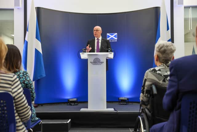 First Minister John Swinney, speaking at Queen Elizabeth University Hospital.