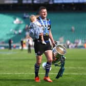 Finn Russell with daughter Skye after helping Bath beat Leicester in the Gallagher Premiership final at the Allianz Stadium at Twickenham on Saturday.