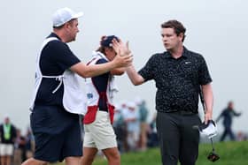 Bob MacIntyre and his caddie Mike  Burrow react at the end of the fina round in the 125th US Open at Oakmont Country Club 