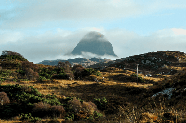 A glebe site near Lochinver with a view to Suilven mountain. The site sits in the heart of an area that has reported its lowest ever population with a report calling for radical action to government to support communities in the North West Highlands deliver strong services. Affordable homes will be built on the land by Assynt Development Trust.