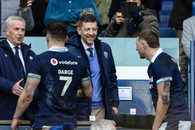 Scottish Rugby chairman John McGuigan and chief executive Alex Williamson with Rory Darge and Finn Russell.