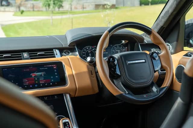 The caramel interior contrasts the Estoril Blue beautifully