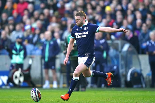 Scotland's Finn Russell has signed a new three-year contract with Bath.