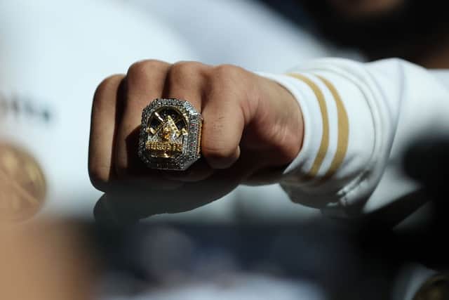Jamal Murray #27 of the Denver Nuggets shows his championship ring before the game against the Los Angeles Lakers at Ball Arena on October 24, 2023.