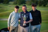 Gourock Golf Club professional Derek Watters shows off the trophy with his two sons after winning the Foremost Championship at The Oxfordshire Golf Hotel & Spa