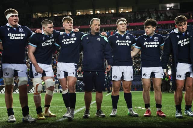 Scotland U20 head coach Kenny Murray, centre, with some of his players.