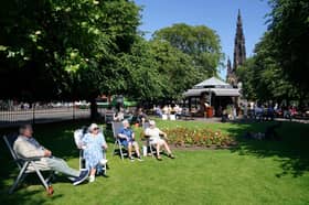 People enjoying the warm weather in Edinburgh's Princes Street Gardens on Thursday. Temperatures could hit 33C this weekend as parts of the UK bask in a heatwave