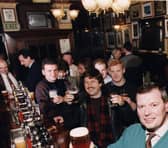 The Bow Bar manager Ian Whyte pictured with customers at the bar in 1990