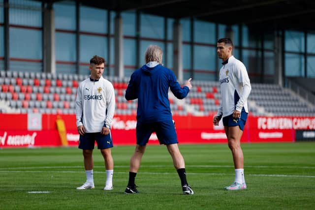 Austin MacPhee imparts some advice to Cristiano Ronaldo during a Portugal training session. Pic: Portuguese Football Federation