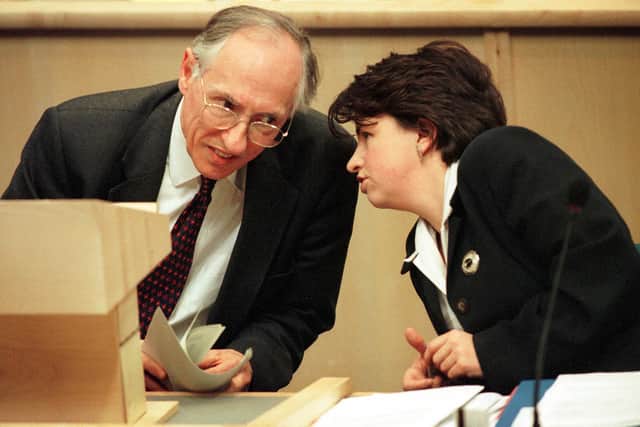First Minister Donald Dewar and Communities Minister Wendy Alexander, pictured immediately before Mr Dewar speaks on repealing section 28.