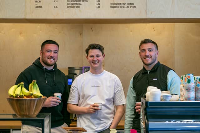 Scottish international rugby star brothers Matt (right) and Zander Fagerson alongside Fraser Smith (centre) at the newly opened Zone.One cafe in St Andrews.