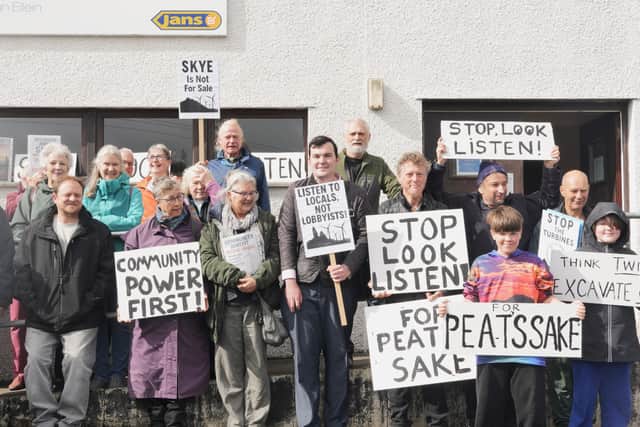 Ruraidh Stewart, centre, with residents from Skye gathering at the inquiry into the Ben Aketil wind farm this week