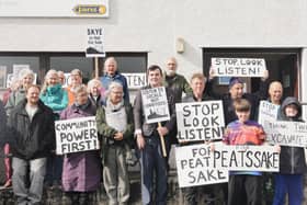  Ruraidh Stewart, centre, with residents from Skye gathering at the inquiry into the Ben Aketil wind farm this week