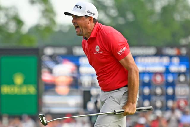 Keegan Bradley reacts to holing the winning putt in the Travelers Championship