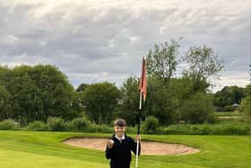 Ritchie Sinclair celebrates making his first hole-in-one at Turriff Golf Club in Aberdeenshire