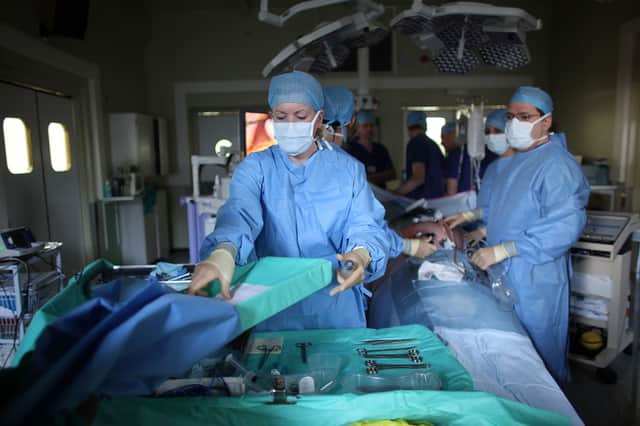Large numbers of people are unable to work while they wait for operations and other medical procedures (Picture: Christopher Furlong)