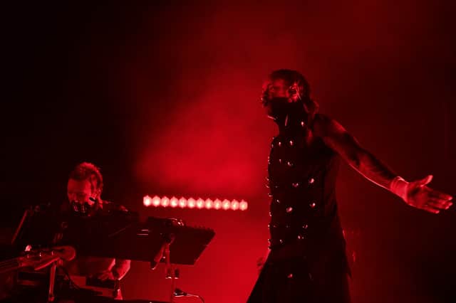 Singer of English electronic dance music band 'The Prodigy', Maxim (R), and co-founder and leader of the band, Liam Paul Paris Howlett, perform onstage.
