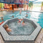 Families relax and play in the heated indoor pool and spa at Solway Holiday Park – one of the leisure facilities included in the Wowcher deal.