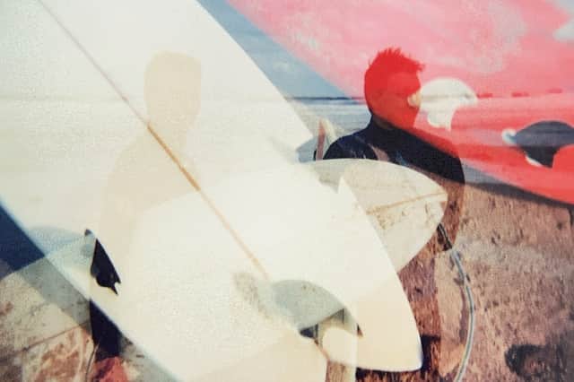 Double exposure of surfers at Blehaven Bay, East Lothian