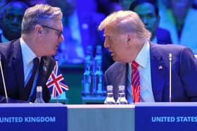 Keir Starmer speaks to US President Donald Trump at the Nato summit in The Hague (Picture: Kin Cheung/pool)