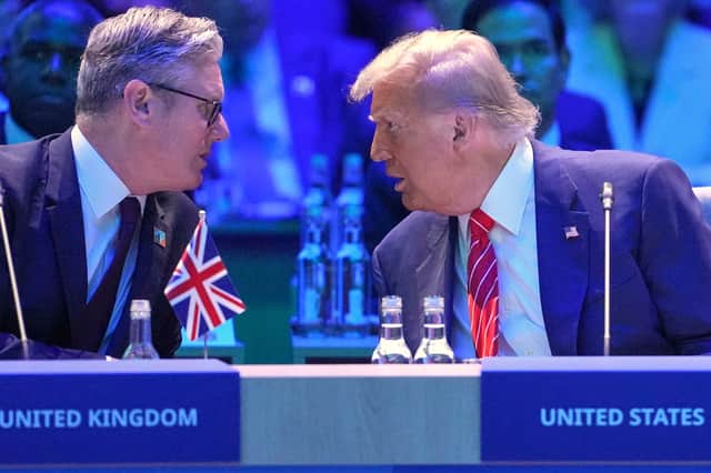 Keir Starmer speaks to US President Donald Trump at the Nato summit in The Hague (Picture: Kin Cheung/pool)