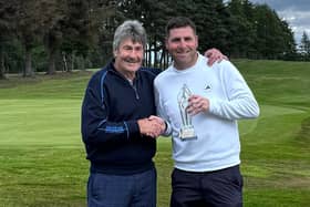 Edzell’s Will Bremner, right, receives The McAlpine - Scottish Mid Amateur Championship trophy from Hamish McAlpine after his play-off win at Alyth