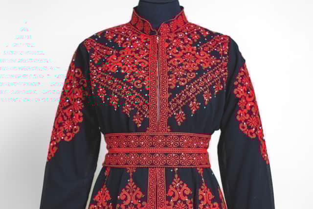 The embroidered dress lent by Nadia El-Nakla, worn at the swearing-in ceremony of her husband, Humza Yousaf as first minister.