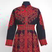 The embroidered dress lent by Nadia El-Nakla, worn at the swearing-in ceremony of her husband, Humza Yousaf as first minister.