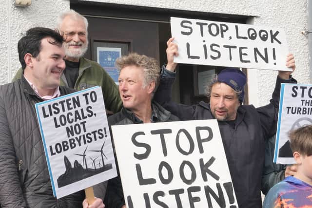 Skye residents standing outside the entrance to the venue where the public inquiry has been taking place this week