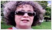 Emma Herdman is described as 5ft 9 in height, of medium build, with short dark brown curly hair.