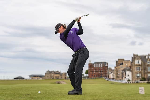 Cameron Adam tees off at the 18th on the Old Course in the St Andrews Links Trophy