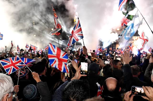 People who supported Brexit celebrate on the day the UK formally left the European Union. Few seem quite so enthusiastic today (Picture: Jeff J Mitchell)