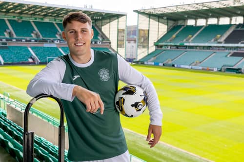Josh Mulligan is pictured at Easter Road after signing for Hibernian.