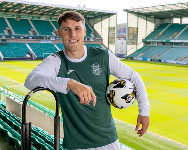 Josh Mulligan is pictured at Easter Road after signing for Hibernian.