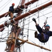 Lorraine Kelly abseils from the mast of the RRS Discovery at Discovery Point in Dundee (Picture: Andrew Milligan)