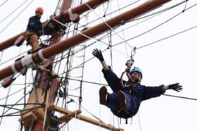 Lorraine Kelly abseils from the mast of the RRS Discovery at Discovery Point in Dundee (Picture: Andrew Milligan)