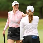 Cassie Porter and Gemma Dryburgh celebrate  during the first round of the Dow Championship at Midland Country Club in Michigan 