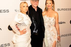 The singer hit the red carpet in a daring Ronald van der Kemp gown