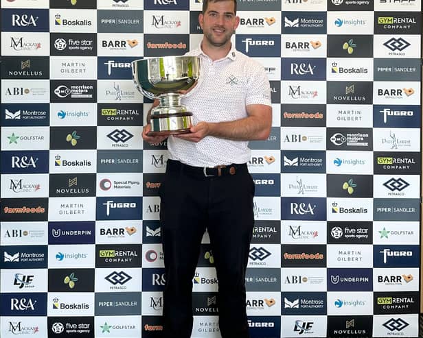 Bradley Neil shows off the trophy after winning the Newmachar Classic presented by Boskalis for the second year in a row