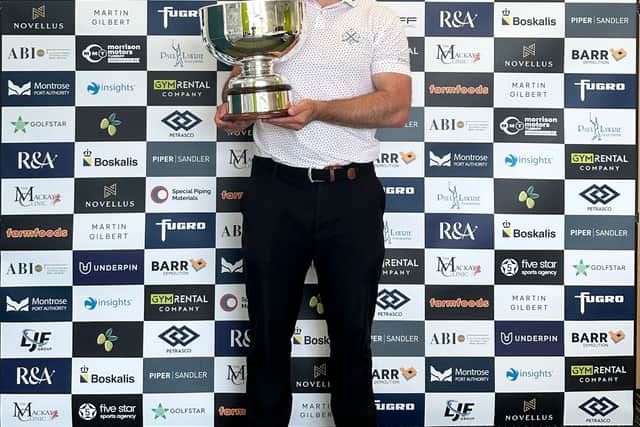 Bradley Neil shows off the trophy after winning the Newmachar Classic presented by Boskalis for the second year in a row
