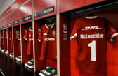 A Lions jersey bearing Ian McLauchlan’s name and number hangs in the away dressing room at Optus Stadium in Perth before the Lions' tour opener against Western Force.