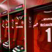 A Lions jersey bearing Ian McLauchlan’s name and number hangs in the away dressing room at Optus Stadium in Perth before the Lions' tour opener against Western Force.