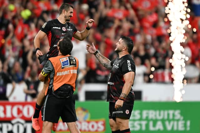 Toulouse's full-back Thomas Ramos, left, celebrates winning the French Top 14 final match against Union Bordeaux-Begles.