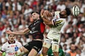 Toulouse's Blair Kinghorn fights for the ball with Bordeaux-Begles full-back Romain Buros during the French Top 14 final in Paris. 
